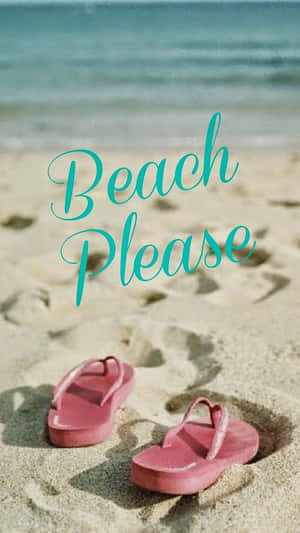 Stylish And Trendy Beach Sandals On Sandy Ocean Shore Wallpaper
