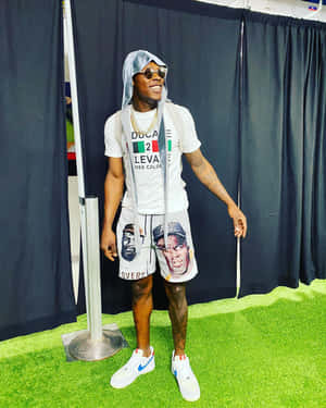 Stylish Athlete Posing Indoors Wallpaper