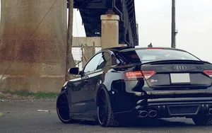 Stylish Audi S5 In Striking Outdoor Scene Wallpaper