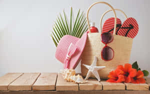 Stylish Beach Hat On A Sunny Seashore Wallpaper