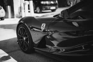 Stylish Black And White Car With A Futuristic Design Wallpaper