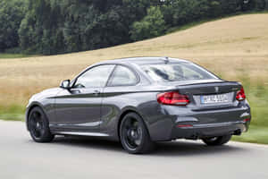 Stylish Bmw 2 Series In Motion Wallpaper