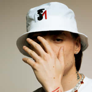 Stylish Bucket Hat Man Covering Face Wallpaper