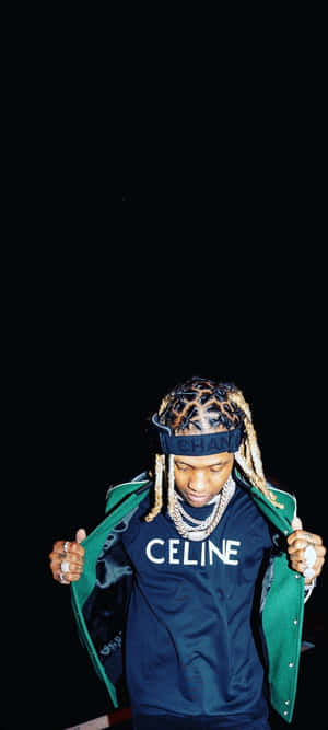 Stylish Celebrityin Celine Shirt Wallpaper