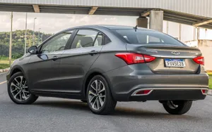 Stylish Chery Arrizo 5 In Dynamic Pose Wallpaper