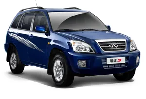 Stylish Chery Suv Cruising On The Open Road Wallpaper