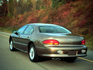 Stylish Chrysler Lhs On The Road Wallpaper