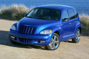 Stylish Chrysler Pt Cruiser On The Road Wallpaper