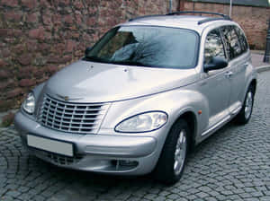 Stylish Chrysler Pt Cruiser On The Road Wallpaper