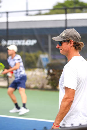 Stylish David Nalbandian Donning Cap And Sunglasses Wallpaper