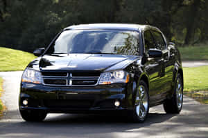 Stylish Dodge Avenger Revving Up For Adventure Wallpaper