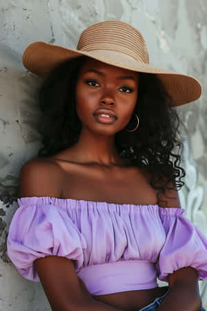 Stylish Ebony Womanin Summer Hat Wallpaper