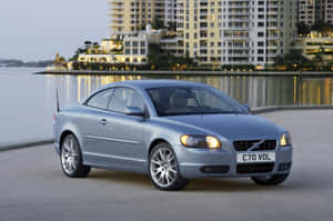 Stylish Elegance Defined: The Volvo C70 In Action Wallpaper