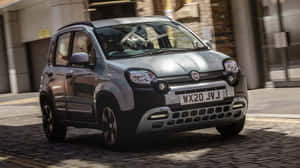Stylish Fiat Panda On The Road Wallpaper