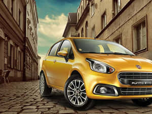 Stylish Fiat Punto In Urban Setting Wallpaper