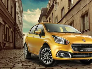 Stylish Fiat Punto In Urban Setting Wallpaper