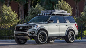 Stylish Ford Expedition On An Open Road Wallpaper