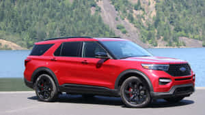 Stylish Ford Explorer On Scenic Road Wallpaper