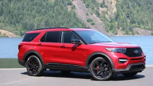 Stylish Ford Explorer On Scenic Road Wallpaper