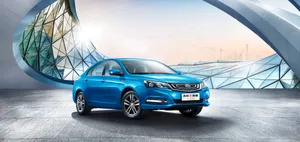 Stylish Geely Emgrand In A Metropolitan Landscape Wallpaper