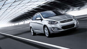 Stylish Hyundai Accent On A Breathtaking Landscape Wallpaper