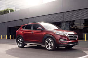 Stylish Hyundai Tucson On A Scenic Drive Wallpaper