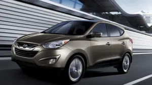 Stylish Hyundai Tucson On The Road Wallpaper