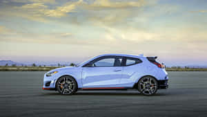 Stylish Hyundai Veloster On The Road Wallpaper