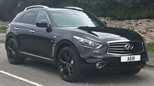 Stylish Infiniti Qx70 Parked On An Urban Street Wallpaper