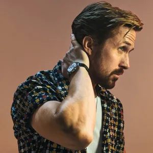 Stylish Man Watch Pose Wallpaper