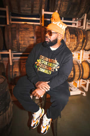 Stylish Manin Beanieand Sneakersat Barrel Cellar Wallpaper