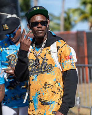 Stylish Manin Hip Hop Attire Wallpaper