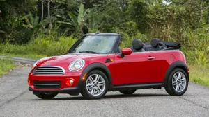 Stylish Mini Cooper Convertible In Action Wallpaper