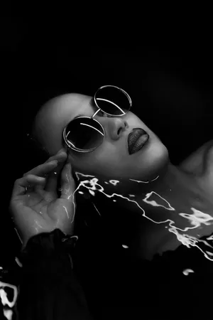 Stylish Model In Monochrome Outfit Wallpaper