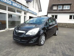 Stylish Opel Meriva In Urban Setting Wallpaper