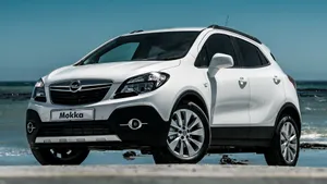 Stylish Opel Mokka On A Scenic Road Wallpaper