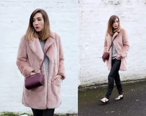 Stylish Pink Coat On Display Wallpaper