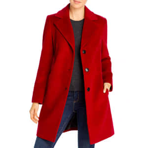 Stylish Red Coat On A Mannequin Wallpaper
