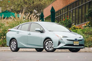 Stylish Red Compact Car In The City Wallpaper