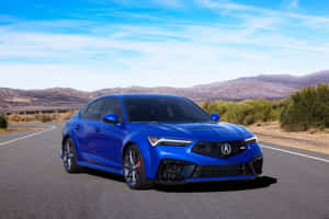 Stylish Red Hatchback On A Picturesque Road Wallpaper