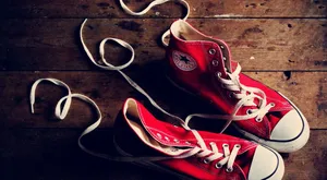 Stylish Red High Heels On A Grayscale Background Wallpaper