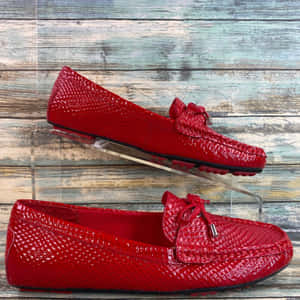 Stylish Red Shoes On Abstract Background Wallpaper