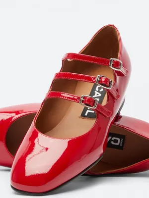 Stylish Red Shoes On Trendy Checkerboard Background Wallpaper