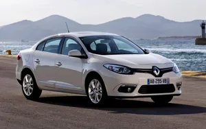 Stylish Renault Fluence Cruising On The Road Wallpaper