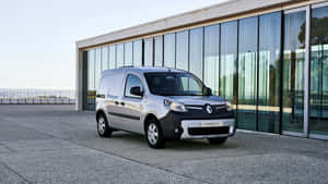 Stylish Renault Kangoo Parked In Picturesque Nature Wallpaper