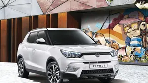 Stylish Ssangyong Suv On The Road Wallpaper