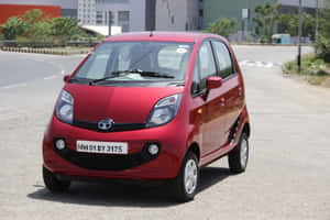 Stylish Tata Motors Vehicle On The Open Road Wallpaper