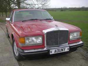 Stylish Vintage Bentley Eight On The Road Wallpaper