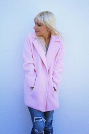 Stylish Woman In Elegant Pink Coat Wallpaper