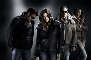 Stylish Woman In Fashionable Winter Outfit Wallpaper